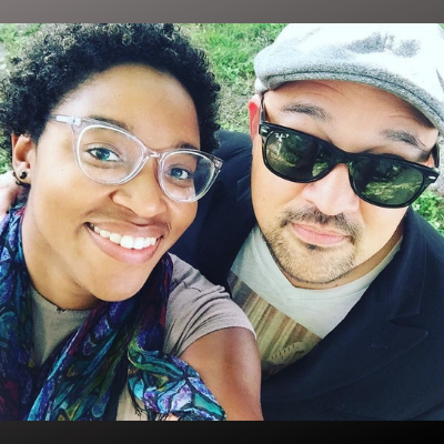 A person and person taking a selfie